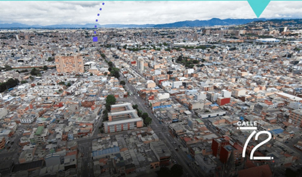 Vista aérea de una zona urbana con edificaciones, una avenida principal, montañas al fondo y el texto “Calle 72” en la esquina inferior.